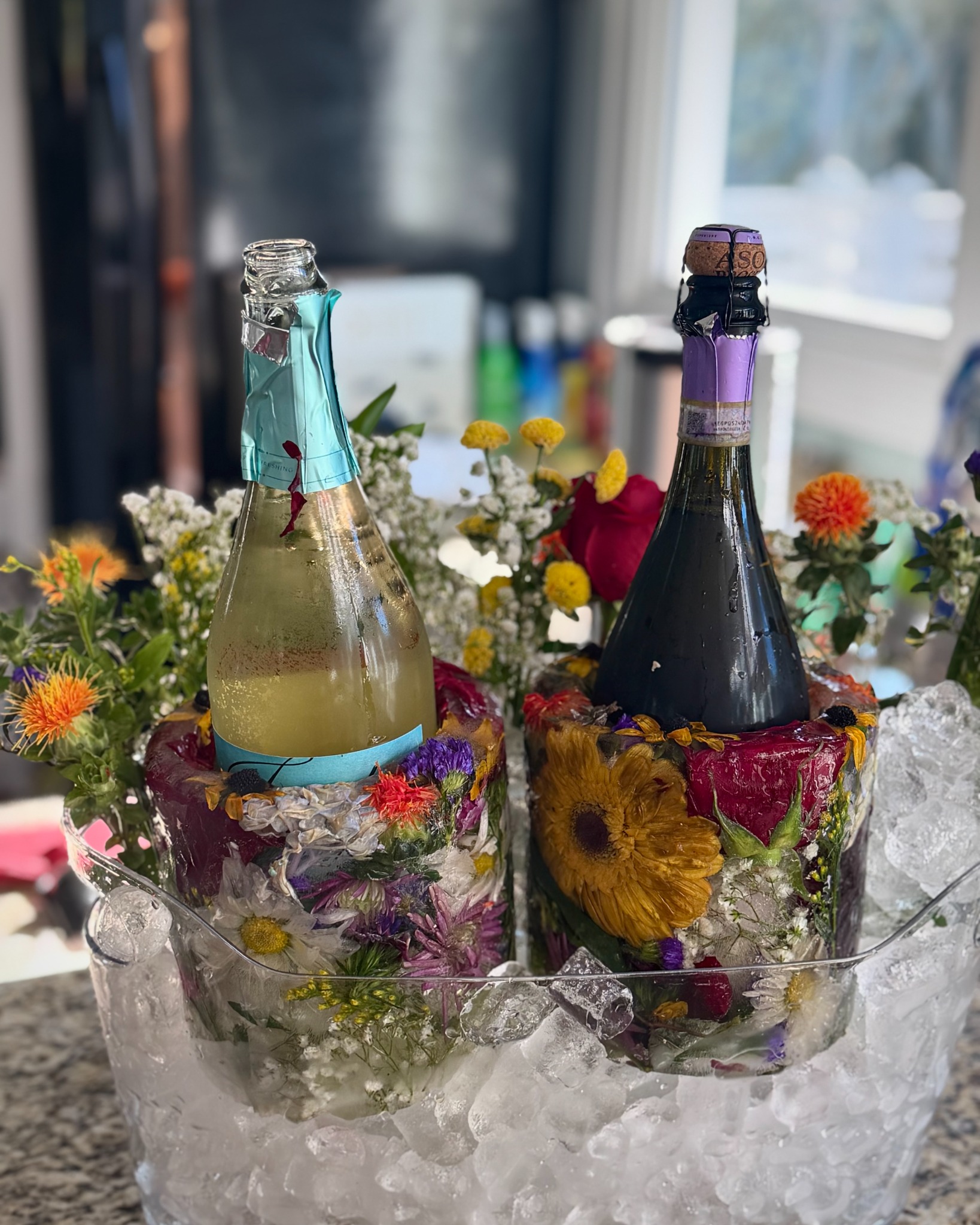 Two floral ice bottle chillers with colorful coordinating flowers